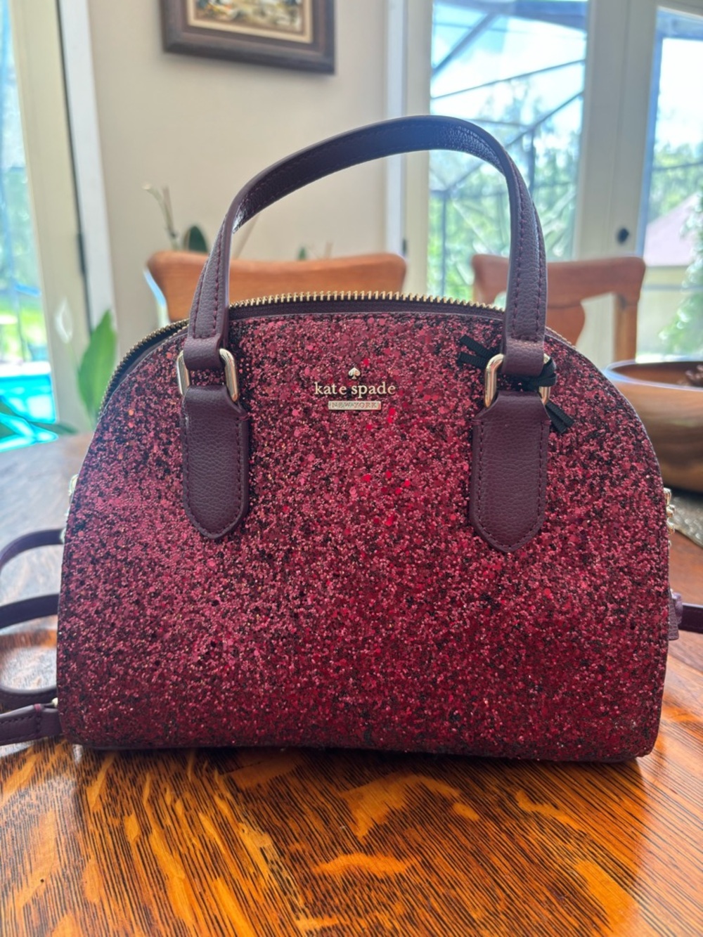 Kate Spade Laurel Way Mini Reiley handbag with glitter
